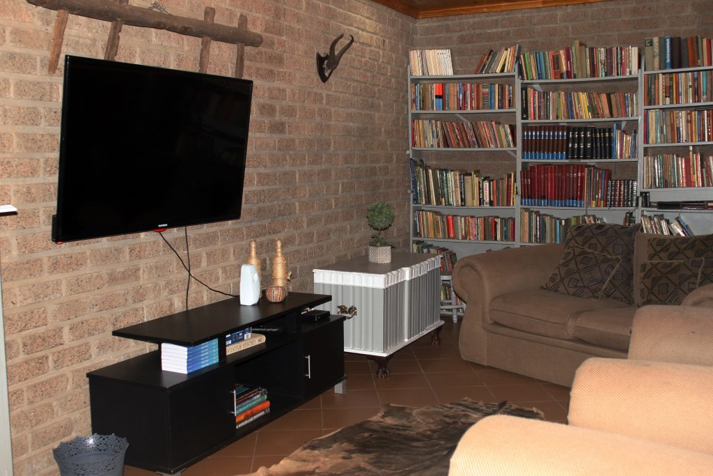 TV Room with DSTV, Wifi & Mini Library